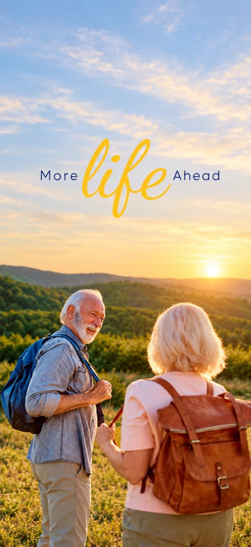 More Life Ahead - Healthy active couple hiking outdoors